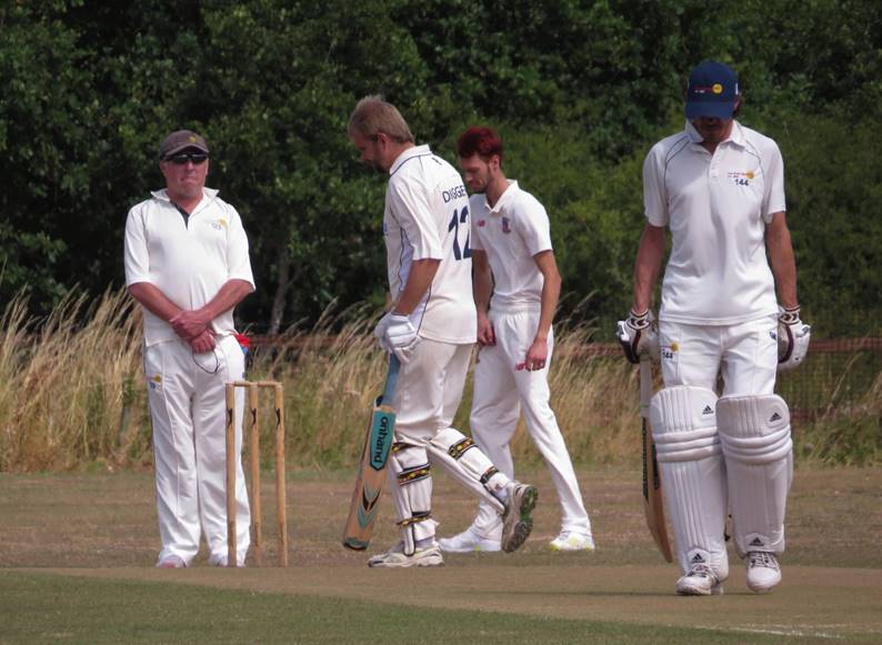 A group of men playing cricket

Description automatically generated with medium confidence